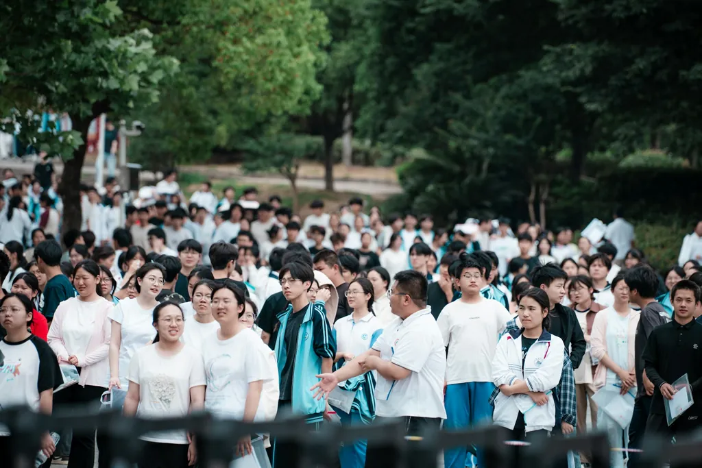 Chinese school students gathered outdoors in uniform — placeholder for a photo of a partner-school delegation visiting the Gaobeidian campus