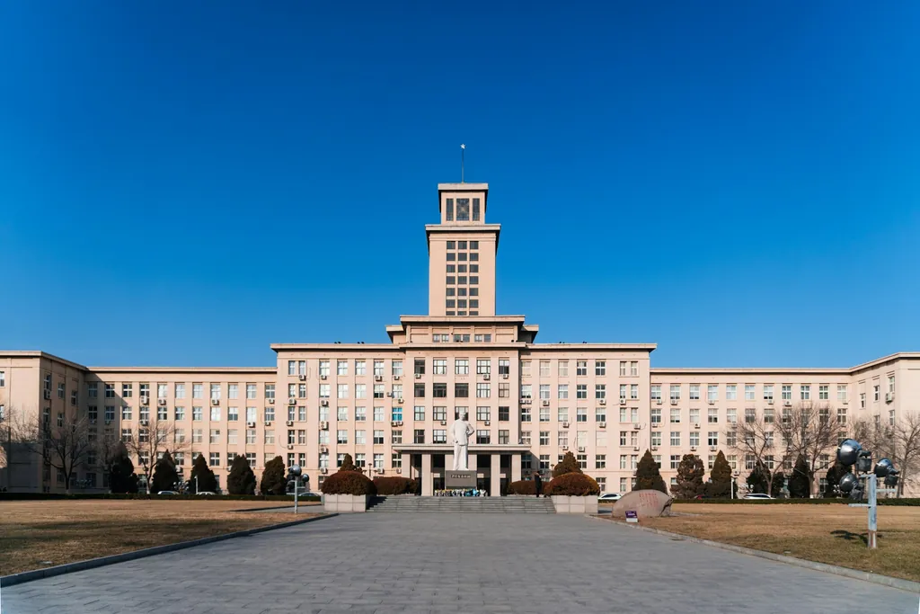 The main teaching building of a Chinese university on a clear day — placeholder for a photo of an adult student on a Chinese university campus
